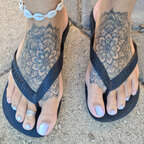Sexy tattooed little feet